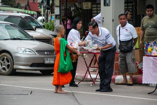 NAN,THAILAND - JULY 19,2016  : The monk walked alms in the morning.