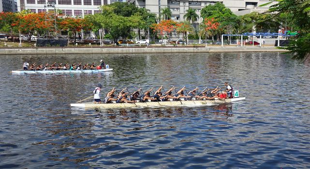 KAOHSIUNG, TAIWAN -- JUNE 10, 2018: Two teams train for the upcoming Dragon Boat Races.