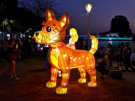 KAOHSIUNG, TAIWAN -- FEBRUARY 19, 2018: Colorful lanterns are on display  on the banks of the Love River during the 2018 Lantern Festival to welcome the Year of the Dog.