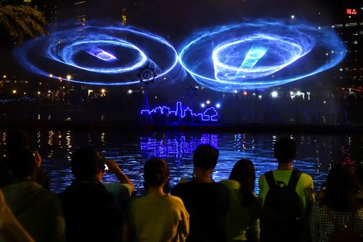 KAOHSIUNG, TAIWAN -- MARCH 2, 2018: A laser light show is on display on the Love River during the 2018 Lantern Festival to welcome the Year of the Dog.