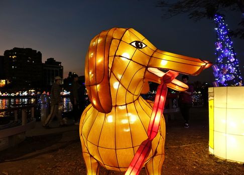 KAOHSIUNG, TAIWAN -- FEBRUARY 19, 2018: Colorful lanterns are on display  on the banks of the Love River during the 2018 Lantern Festival to welcome the Year of the Dog.