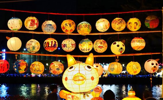 KAOHSIUNG, TAIWAN -- FEBRUARY 19, 2018: Colorful lanterns are on display  on the banks of the Love River during the 2018 Lantern Festival to welcome the Year of the Dog.
