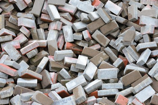 A heap of calcium silicate bricks on a construction site