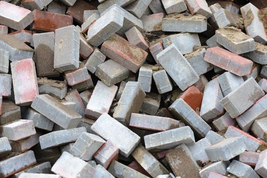 A heap of calcium silicate bricks on a construction site