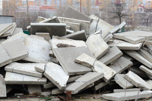 Detail of old and damaged reinforced concrete slabs on an abandoned construction site