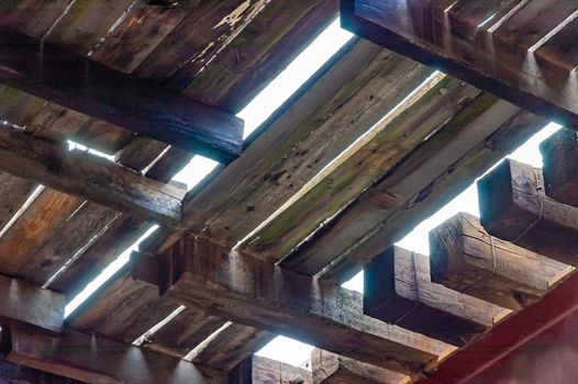 View of a wooden bridge from below