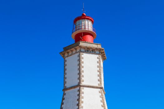 Sesimbra, Portugal - August 8, 2018: architectural detail of the Cape Espichel Lighthouse. Managed by the Portuguese National Maritime Authority, it entered service in 1790