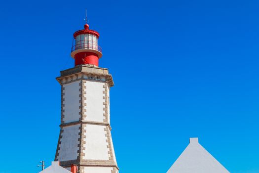 Sesimbra, Portugal - August 8, 2018: architectural detail of the Cape Espichel Lighthouse. Managed by the Portuguese National Maritime Authority, it entered service in 1790