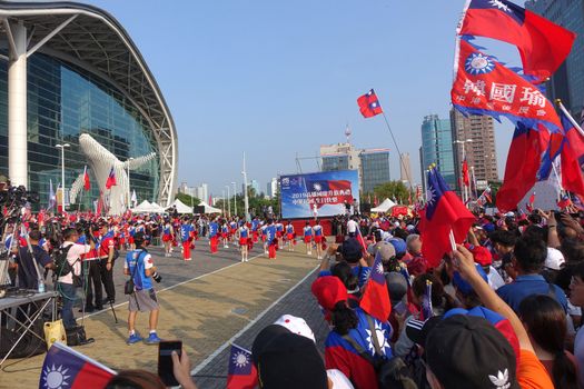 KAOHSIUNG, TAIWAN -- OCTOBER 10, 2019: Cheerleaders dressed in national flag colors perform as part of the national day celebrations at a free, public event. 
