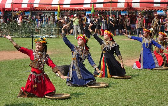 KAOHSIUNG, TAIWAN -- SEPTEMBER 28, 2019: Women of the indigenous Rukai tribe perform a dance during the traditional harvest festival.
