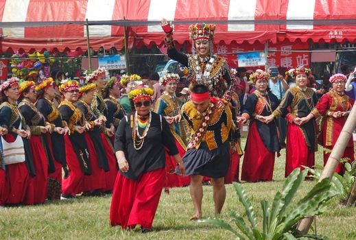 KAOHSIUNG, TAIWAN -- SEPTEMBER 28, 2019: Women of the indigenous Rukai tribe perform a dance during the traditional harvest festival.