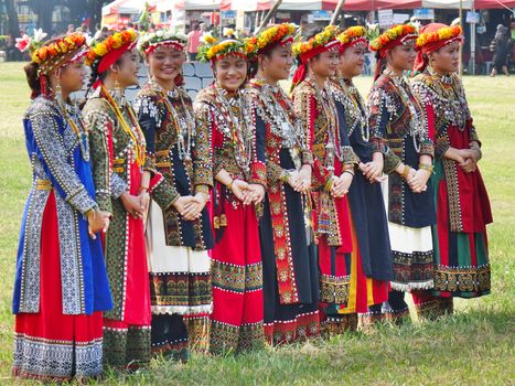 KAOHSIUNG, TAIWAN -- SEPTEMBER 28, 2019: Women of the indigenous Rukai tribe perform a dance during the traditional harvest festival.