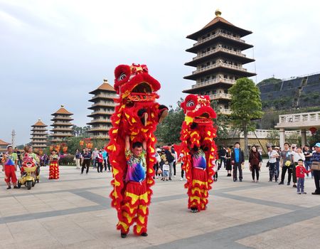 KAOHSIUNG, TAIWAN -- JANUARY 25, 2020: Traditional Chinese Lion dancers perform at the Fo Guang Shan Buddhist complex during Chinese New Year.