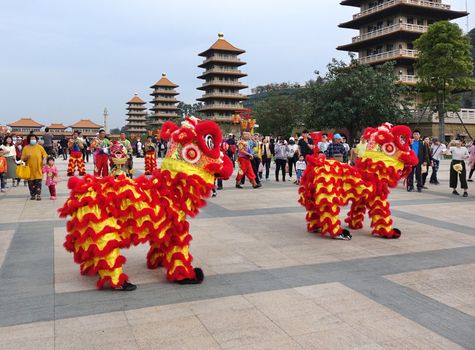KAOHSIUNG, TAIWAN -- JANUARY 25, 2020: Traditional Chinese Lion dancers perform at the Fo Guang Shan Buddhist complex during Chinese New Year.