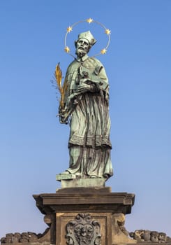 Statue of John of Nepomuk on the Charles bridge in Prague, Czech Republic