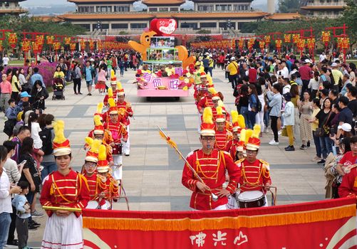 KAOHSIUNG, TAIWAN -- JANUARY 25, 2020: A parade at the Fo Guang Shan Buddhist complex during Chinese New Year. The Chinese characters mean Buddha Mountain.