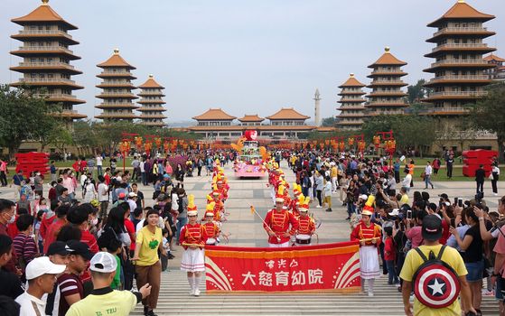 KAOHSIUNG, TAIWAN -- JANUARY 25, 2020: A parade at the Fo Guang Shan Buddhist complex during Chinese New Year. The Chinese characters mean "Da Zi Children's Home".