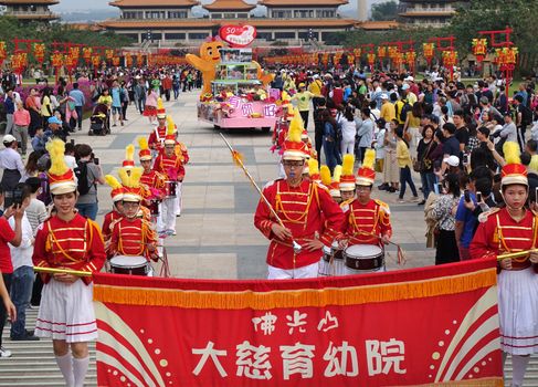KAOHSIUNG, TAIWAN -- JANUARY 25, 2020: A parade at the Fo Guang Shan Buddhist complex during Chinese New Year. The Chinese characters mean "Da Zi Children's Home". 