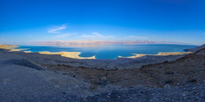 Panoramic landscape of the coastline of the Dead Sea, between Israel and Jordan