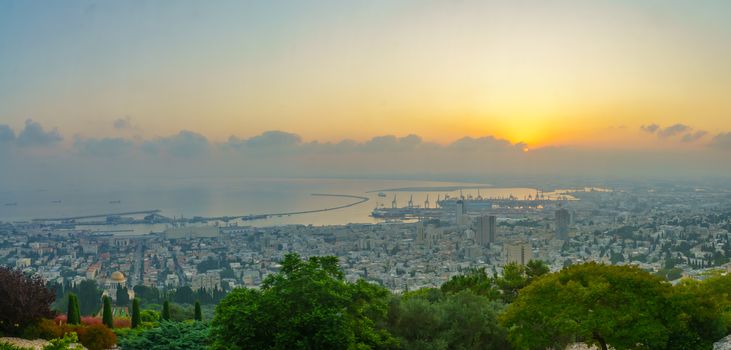 Panoramic sunrise view of the downtown, the port, the bay area and the Bahai Shrine, in Haifa, Northern Israel