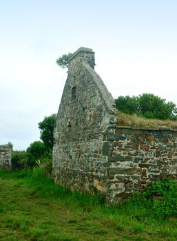 Old abandoned cottage from the days of potato famine in Ireland.