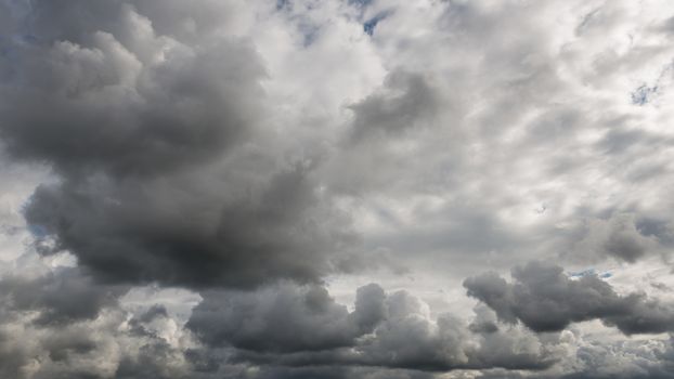 Dramatic dark cloudy sky, stormy or rainy weather natural background