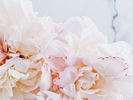 Bouquet of peony flowers on luxury marble background, wedding flatlay and event branding design