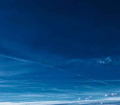 Bright blue sky with clouds, nature and environmental background