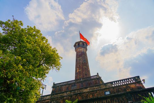 Flag of Vietnam on old tower in Vietnam Military History Museum and OLD QUARTER CITY in HANOI VIETNAM