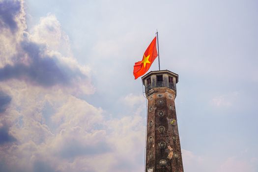 Flag of Vietnam on old tower in Vietnam Military History Museum and OLD QUARTER CITY in HANOI VIETNAM