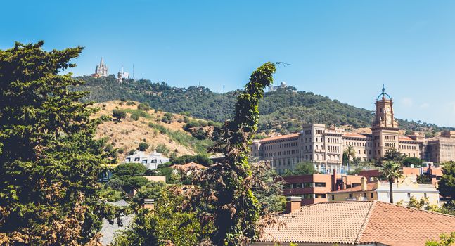 Barcelona, Spain - June 20, 2017: View of Pia de Sarria school on the heights of the city on a summer day