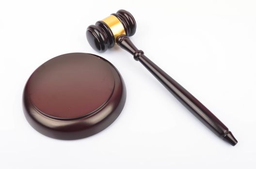 View of a judge hammer or gavel on white background. Law and jurisdiction concept.