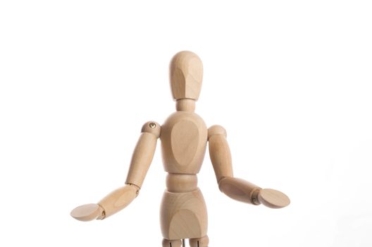 Wooden figure mannequin posing in action isolated on white background.