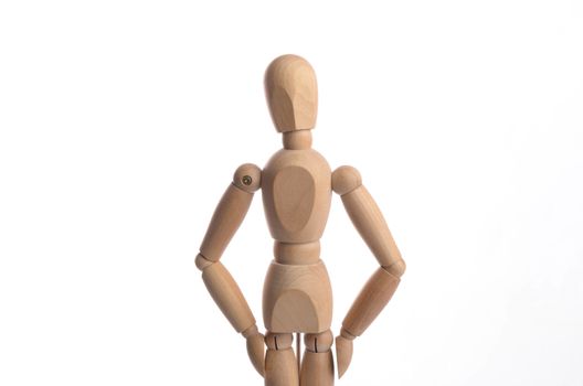 Wooden figure mannequin posing in action isolated on white background.