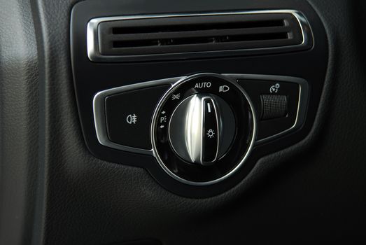 Closeup image of car lighting control switch