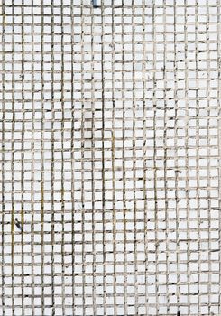 White old tweathered tile background texture captured with a sunlight