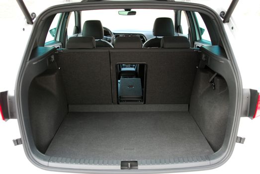 Empty trunk of the small white suv