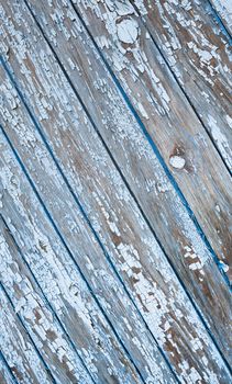 Old painted texture vintage wood background with peeling paint. Painted weathered plain teal blue and white Rustic Wood Board Back ground that can be either horizontal or vertical