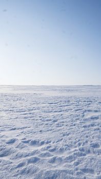 A Field covered with a snow in winter season. Winter countryside landscape