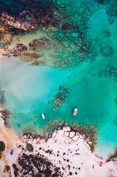 Aerial drone shot of beautiful turquoise beach with pink sand Elafonissi, Crete, Greece. Best beaches of Mediterranean, Elafonissi beach, Crete, Greece. Famous Elafonisi beach on Greece island, Crete.