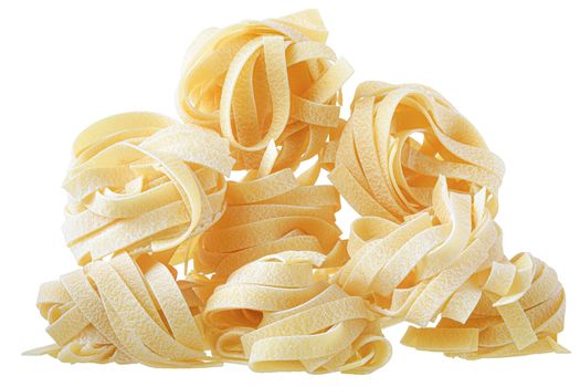 pasta pappardelle nest close up isolated on a white background.