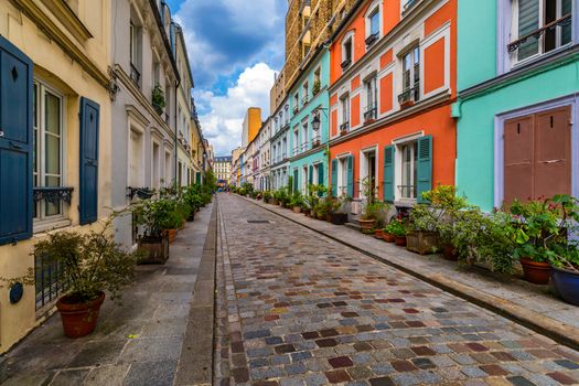 Cremieux Street (Rue Cremieux), Paris, France. Rue Cremieux in the 12th Arrondissement is one of the prettiest residential streets in Paris. Colored houses in Rue Cremieux street in Paris. France.