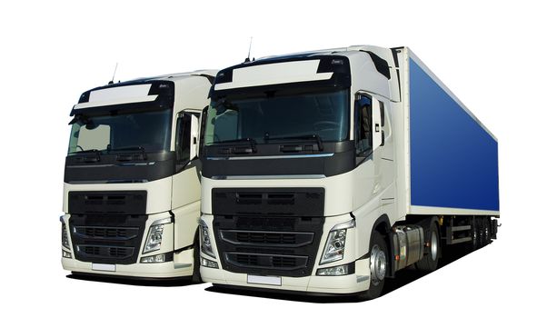two large trucks with semi trailer on a white background
