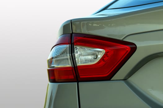 the tail lights on a luxury passenger car
