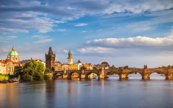 Famous iconic image of Charles bridge, Prague, Czech Republic. Concept of world travel, sightseeing and tourism.