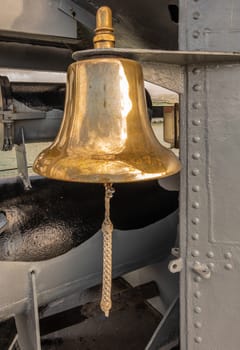 Oahu, Hawaii, USA. - January 10, 2020: Pearl Harbor. Closeup of gold colored shiip bell of long submarine USS Bowfin.