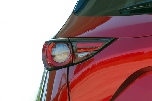 the tail lights on a luxury passenger car
