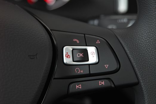 detail on the steering wheel with controls