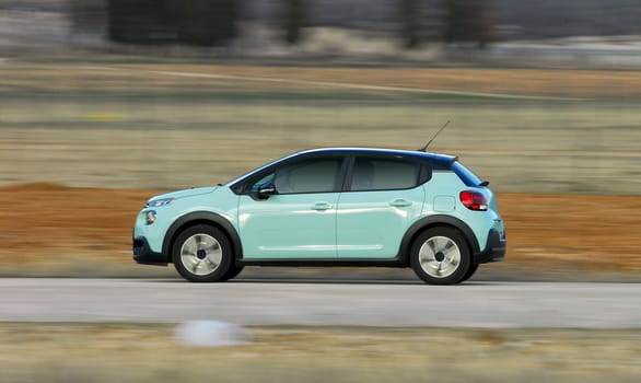 car photographed at high speeds