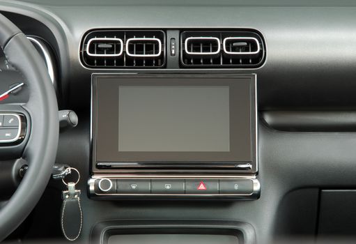 Modern car dashboard. Screen multimedia system. Interior detail